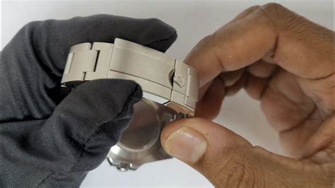 how to adjust rolex metal strap|Rolex watch glide lock adjustment.